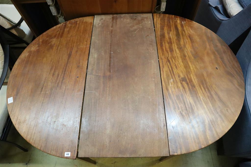 A George III mahogany D end extending dining table, width 164cm, depth 114cm, height 72cm